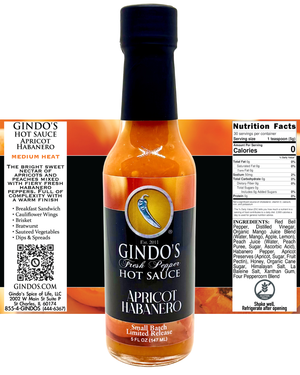 Gindo's Apricot Habanero hot sauce bottle with label and nutrition facts on a white background