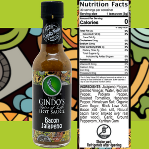 Bottle of Gindo's Spice of Life Hot Sauce with nutrition facts label on a colorful background