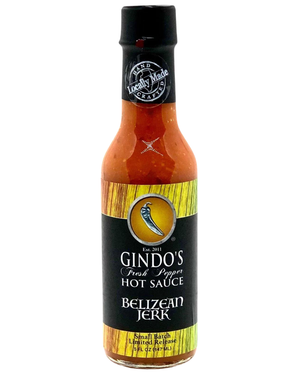 Bottle of Gindo's Belizean Jerk hot sauce on a white background