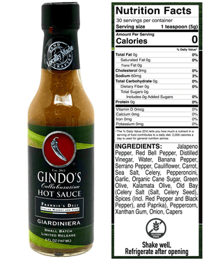 A bottle of Gindo's Caliberation Hot Sauce next to a detailed Nutrition Facts label and ingredients list on a white background.