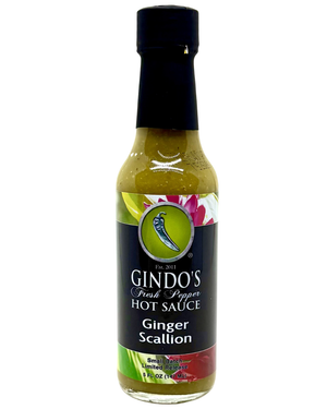 Bottle of Gindo's Ginger Scallion hot sauce on a white background