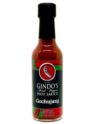 Bottle of Gindo's Fresh Pepper Hot Sauce on a white background