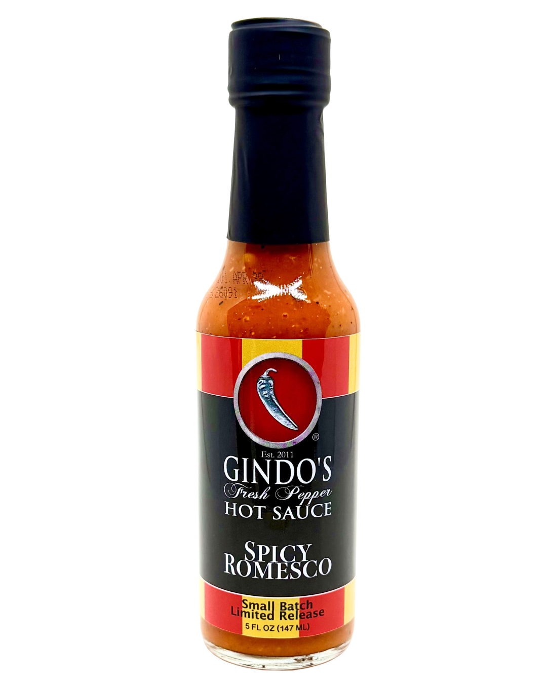 Bottle of Gindo's Spicy Romesco hot sauce on a white background