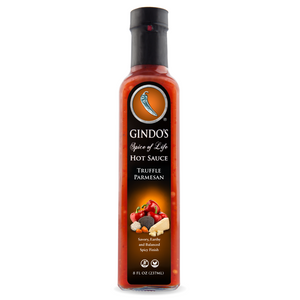 Bottle of Gindo's Truffle Parmesan hot sauce on a white background